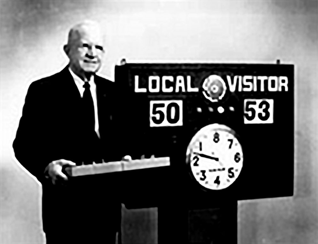 Founder-Elmer-Foster-beside-his-Model-A-scoreboard