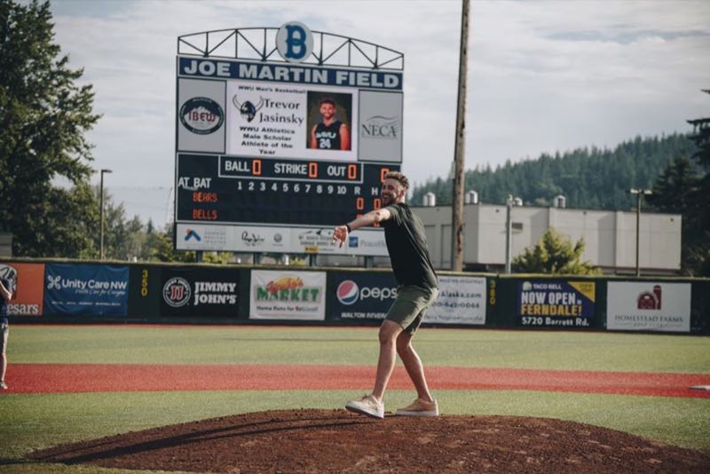 Bellingham Bells pitcher in front of the BA-7136-2 line score