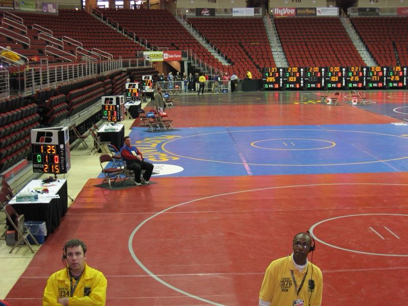 Wrestling mats with Fair-Play match clocks